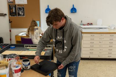 Students work on 2D art projects