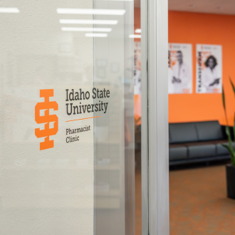 pharmacist and customer in otc section