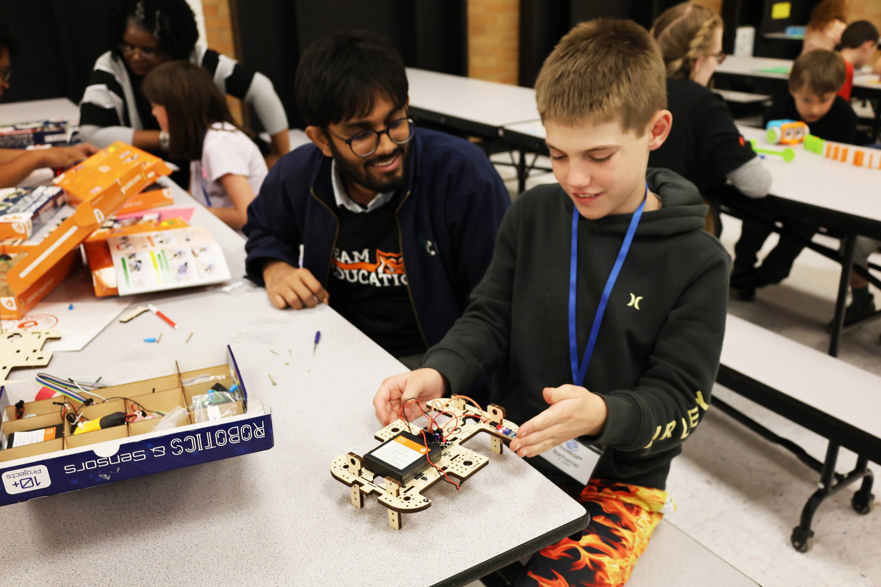 Education students doing a STEM night with elementary students