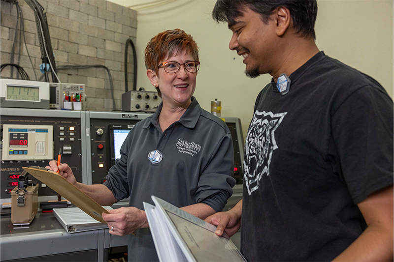 Mary Lou Dunzik-Gougar, professor of nuclear engineering, and Maruf Anwarul, graduate student, pose for a photo in the Nuclear Engineering Laboratory on Idaho State University’s Pocatello campus.