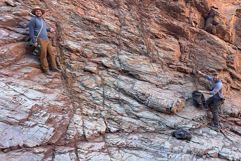 Right, Kurt Sundell, assistant professor of geosciences at Idaho State University, and Ryan Nielsen, an undergraduate student at ISU, point out fault relationships in Monarch Canyon near Death Valley, California.
