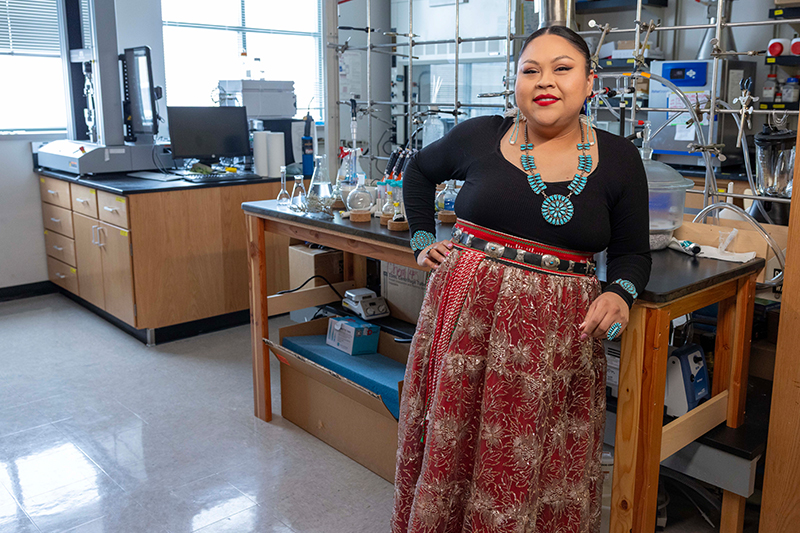 Veronica Miller poses for a photo in a chemistry lab on ISU's Pocatello campus.