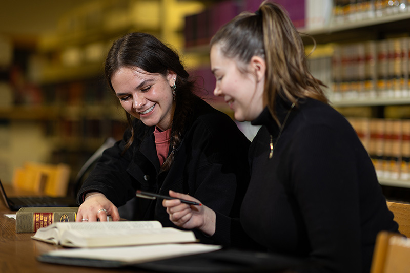 Paralegal Studies students working in the Law Libarary