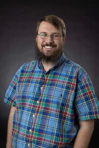 Headshot of Andrew Moon Services Specialist