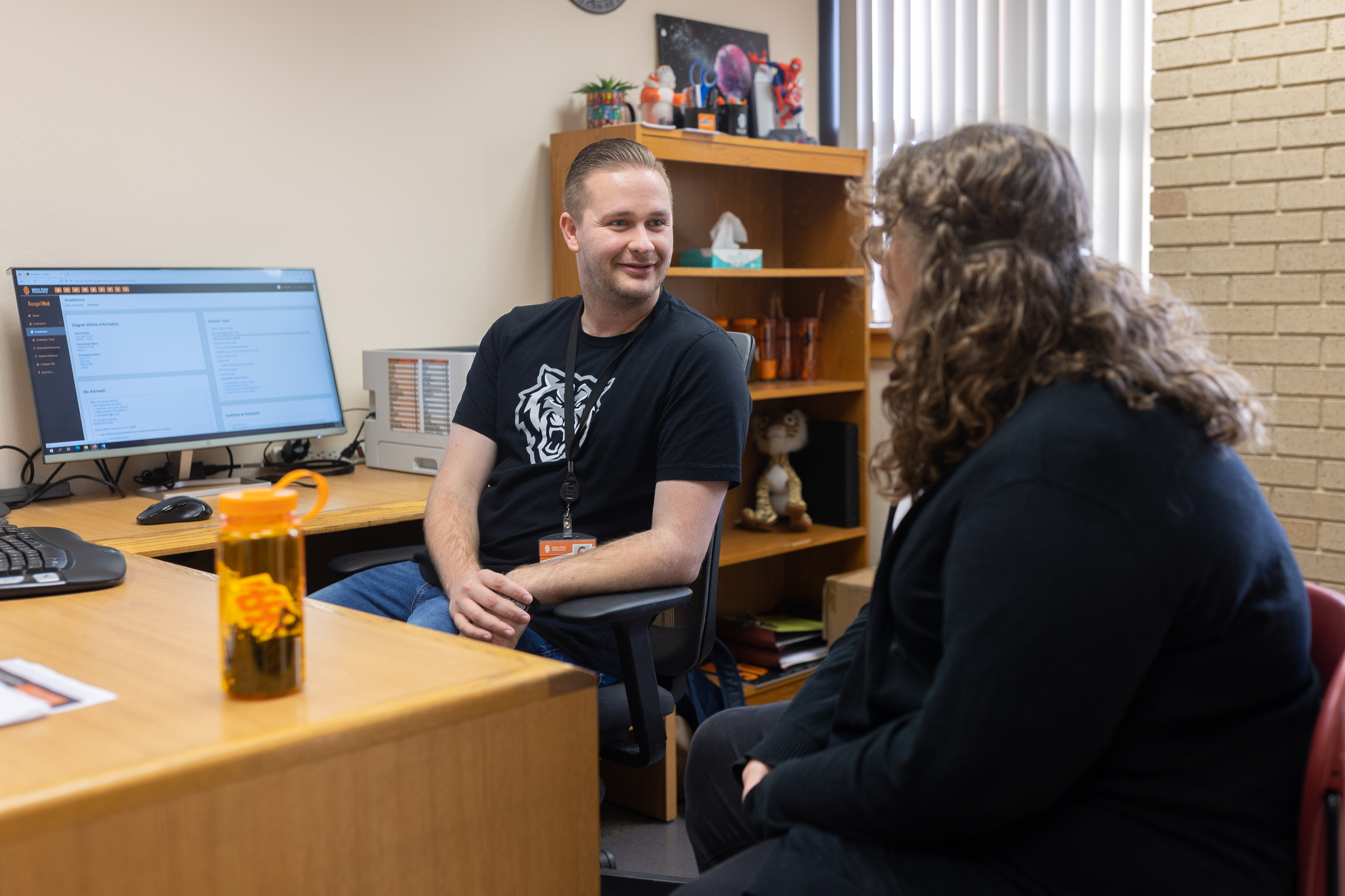 An advisor advising a student