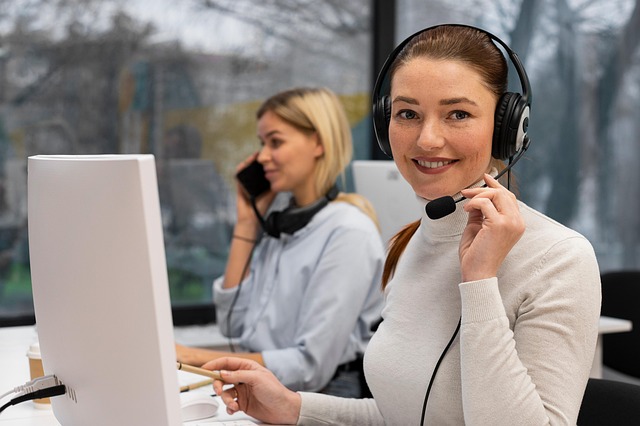 Two women in a call center answering calls