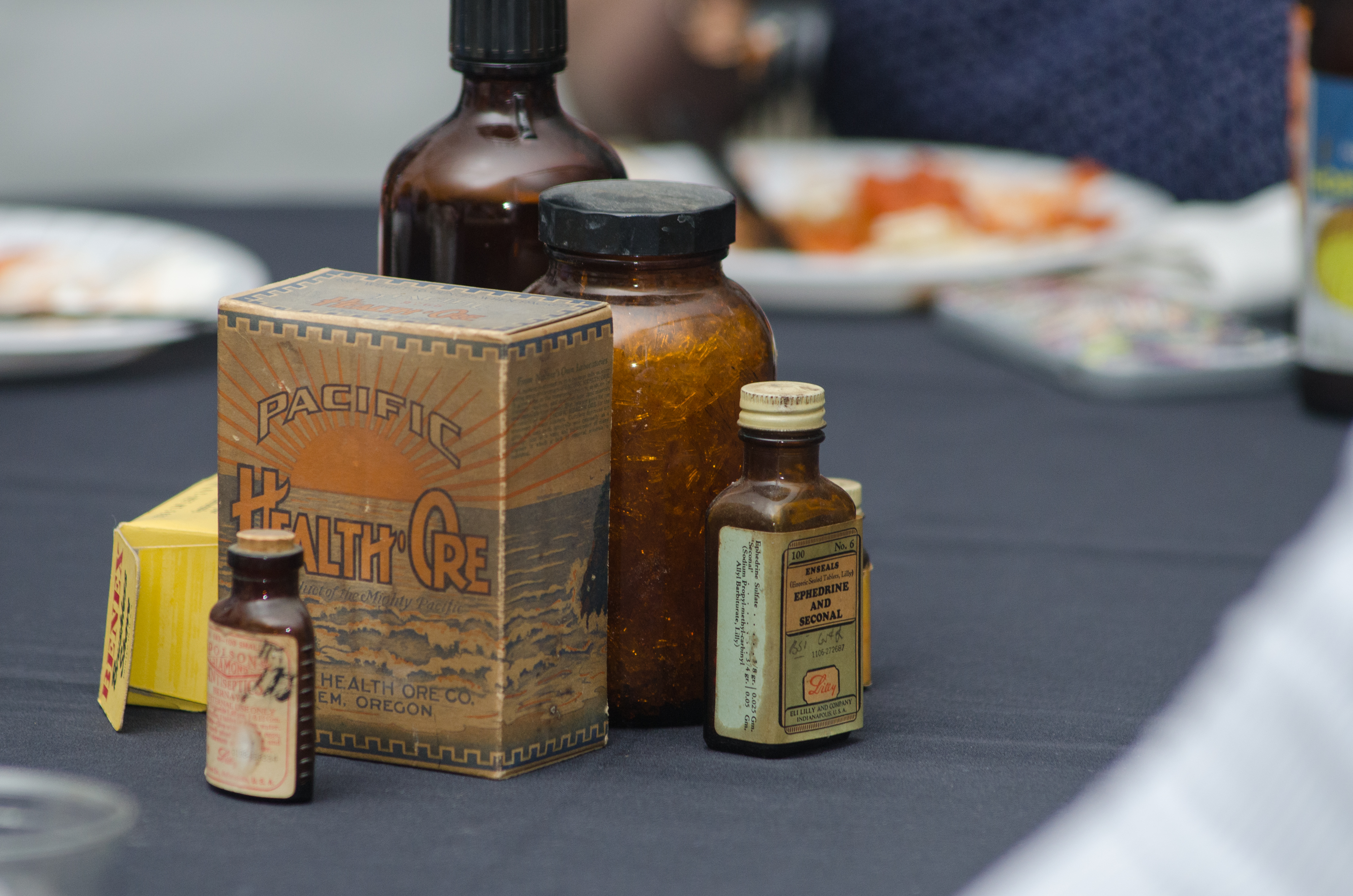 A grouping of old pharmacy bottles