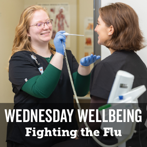 two nursing students practice taking tempuratures