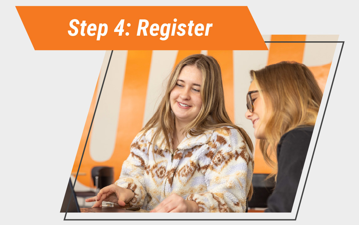 Graphic featuring an orange banner reading “Step 4: Register” above two smiling students working together on a laptop. The photo is framed by an angled geometric border on a light gray background.