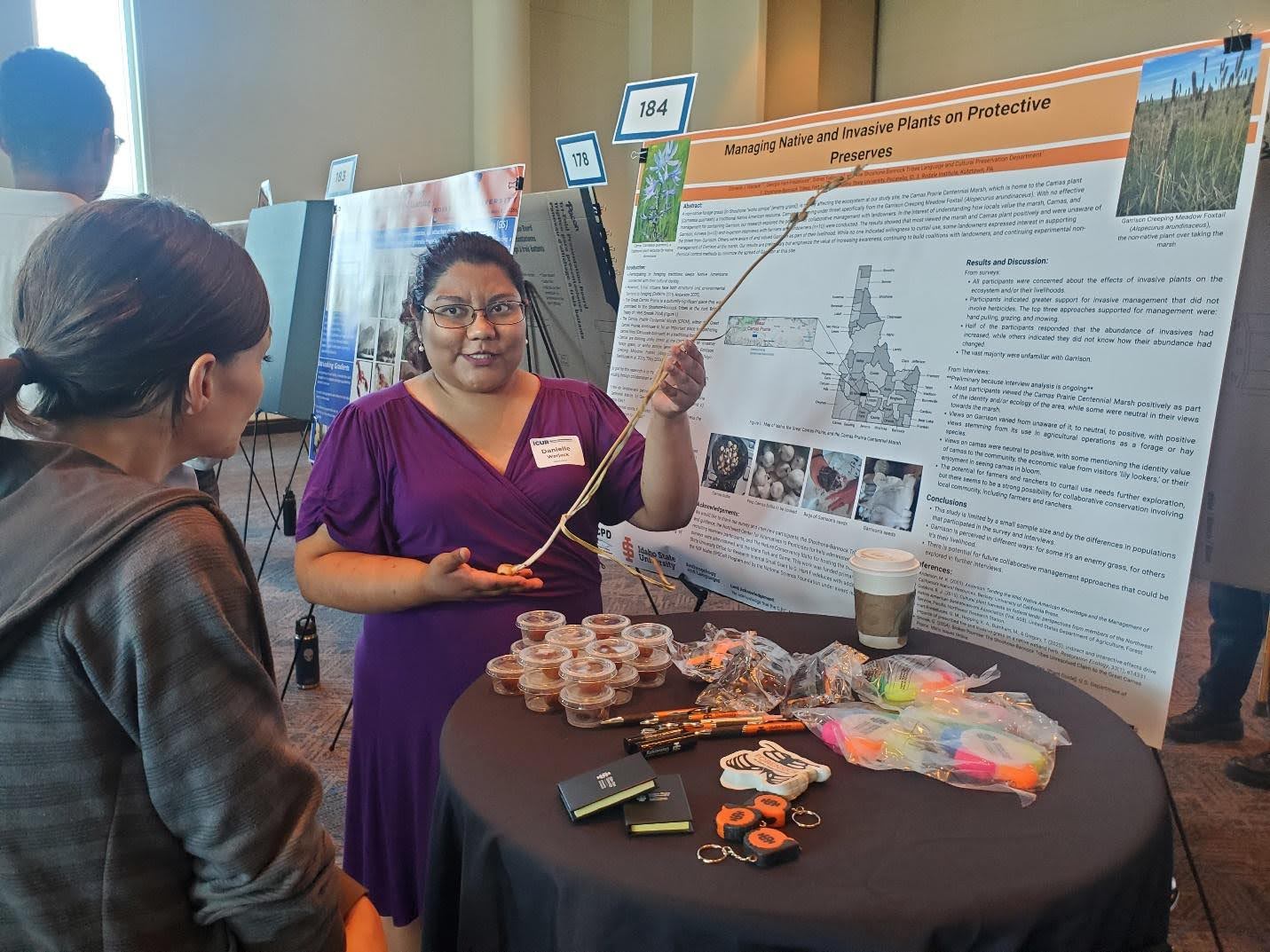 Student presents poster at research conference