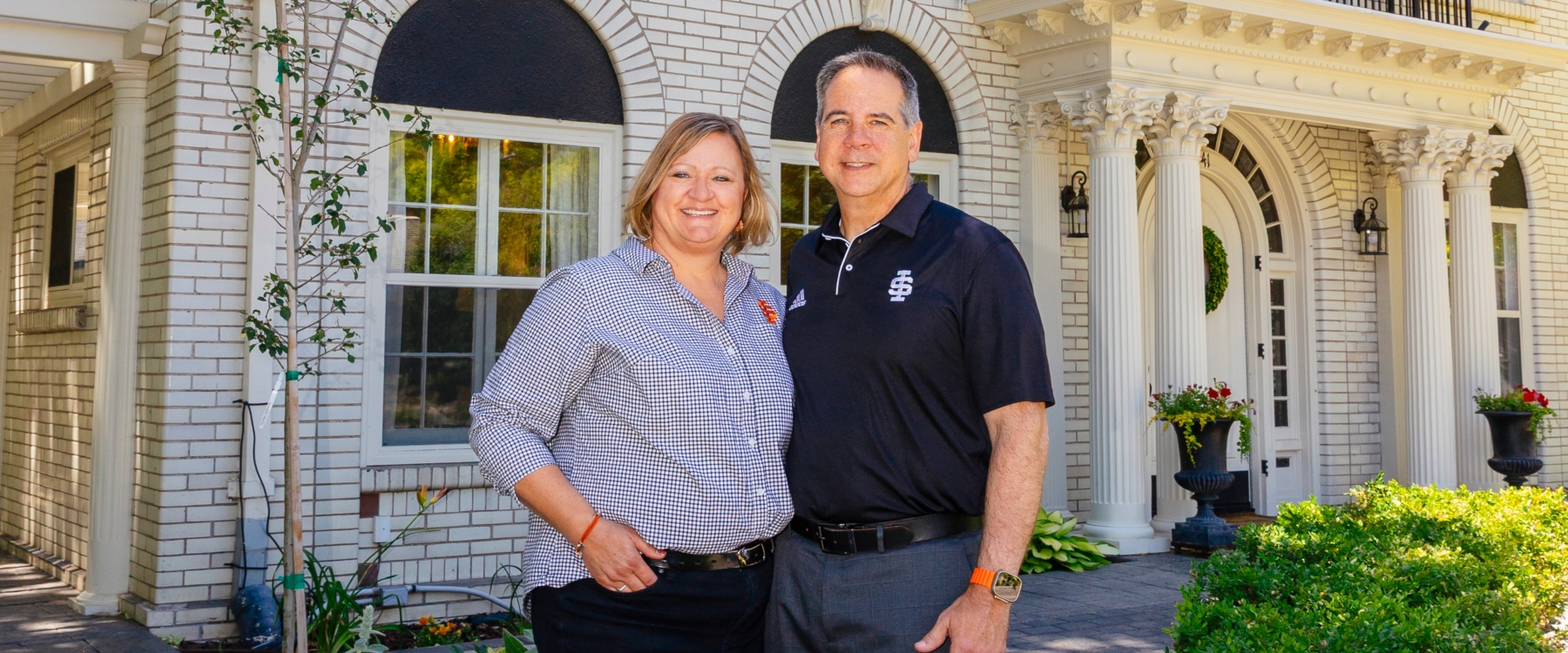 President Wagner and Tracy in front of the Presidential house